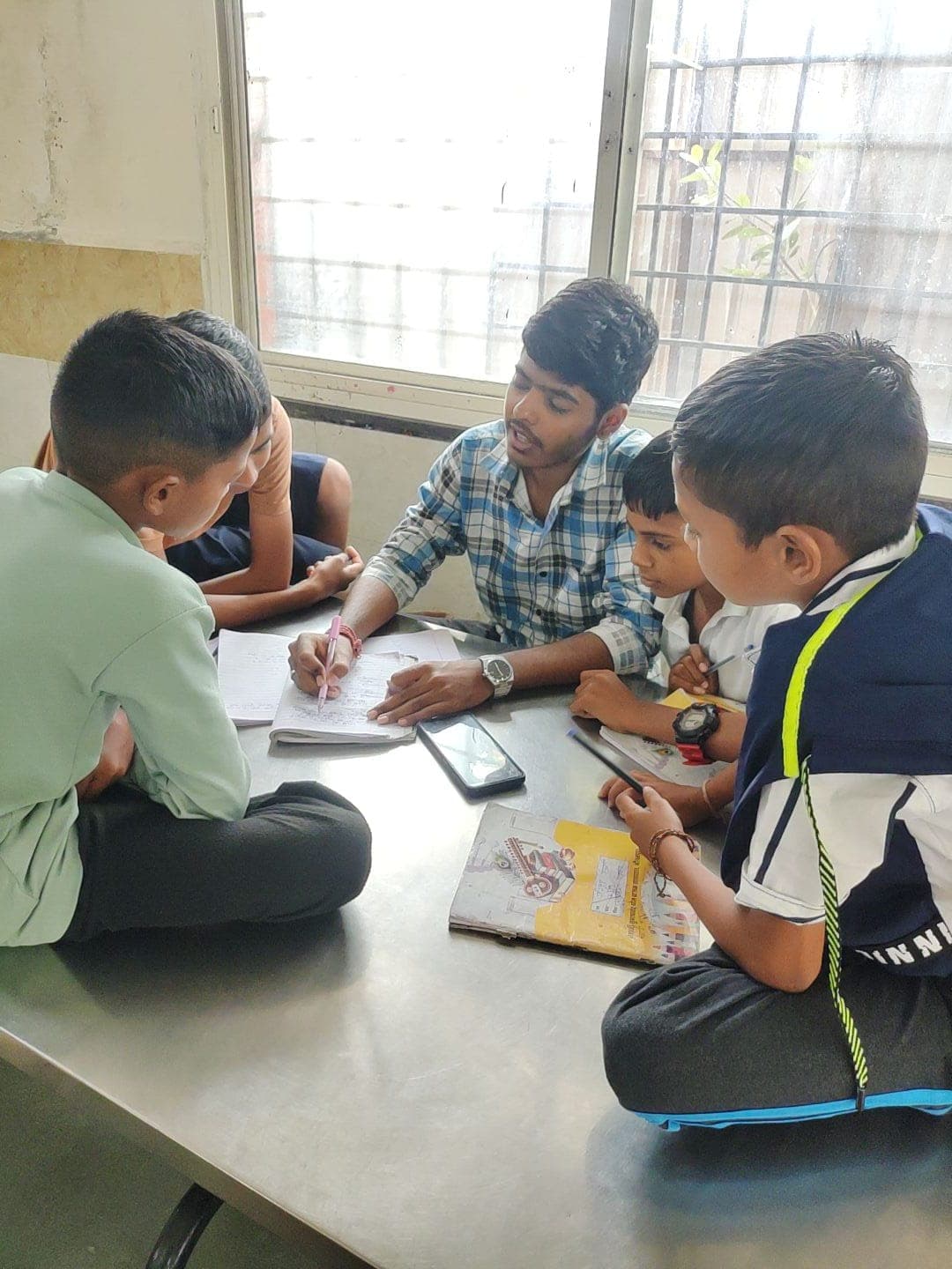 Child smiling during a community learning activity